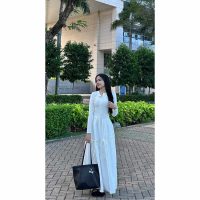 Chân váy maxi dài đính nơ mềm rủ tạo cảm giác bay bổng khi bước đi