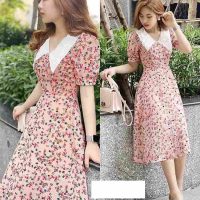 Đầm hoa xòe cổ sen nhọn phối nút bọc xinh xắn tạo nên nét đẹp hoàn hảo từng chi tiết