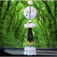 Khánh ngọc trắng treo xe ô tô là lựa chọn hàng đầu cho sự bình an và thành công