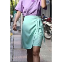 Trải nghiệm phong cách tiểu thư ngọt ngào cùng sản phẩm chân váy nơ xanh ngọc đẹp